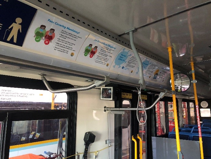 Interior of bus showing safety signage